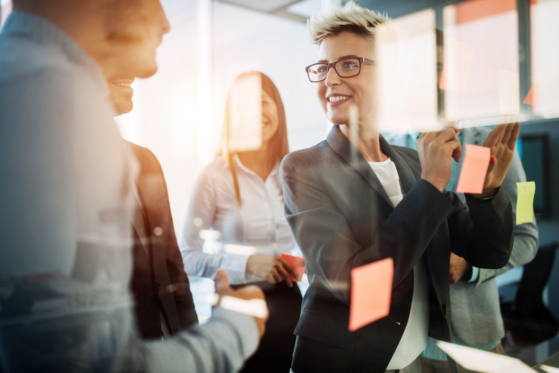Data Understood consultants working through a data problem together