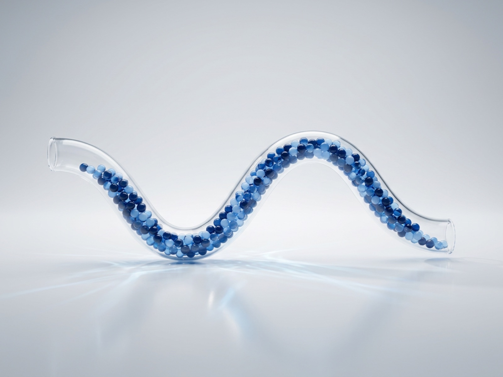 Glass pipeline with blue beads flowing through, representing scalable product data pipelines