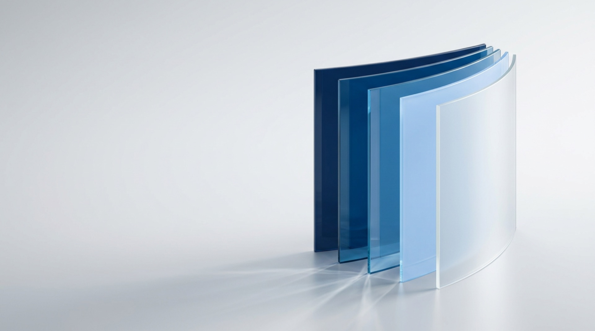 Fanned glass pages in brand blue representing audience data for media and publishing